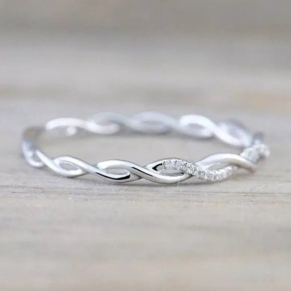 Anthropologie Jewelry - White Gold Delicate Twisted Eternity Band Ring